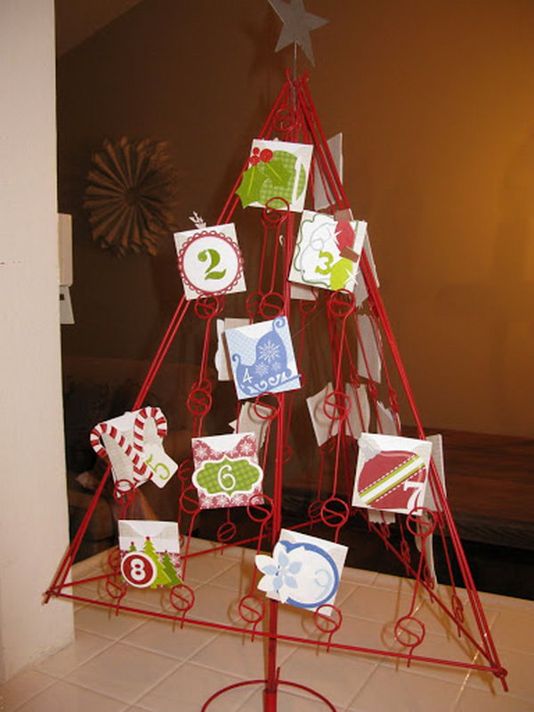 Use a red wire christmas tree as advent calendar. This advent calendar is a fun, popular way for kids and adults to count down the days until Christmas. Kids would love the surprises hidden behind each day.