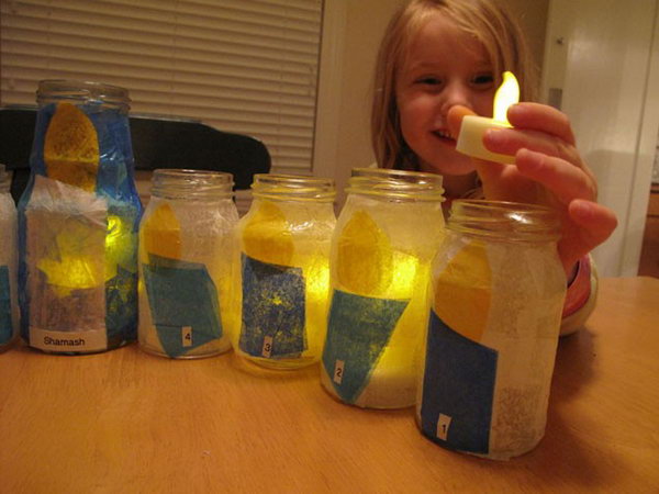 Make a tot-friendly menorah with recycled glass jars and LED tea lights. 