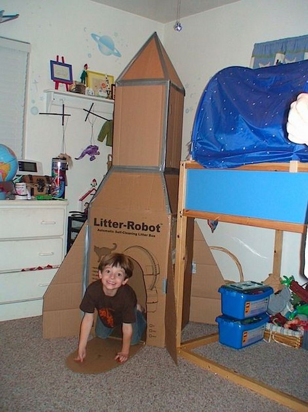 What an awesome DIY playhouse idea for this carboard rocket ship. 
