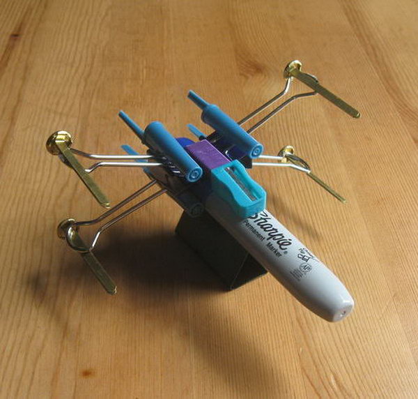 Do you remember the X-Wing Fighter in Star Wars? This cool X-Wing Fighter is made from office supplies. 