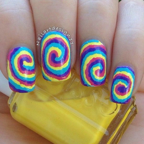 Cute And Creative Swirl Nail Art. Created using a technique called water marbling. It involves swirling together different colored nail polishes on nails. 