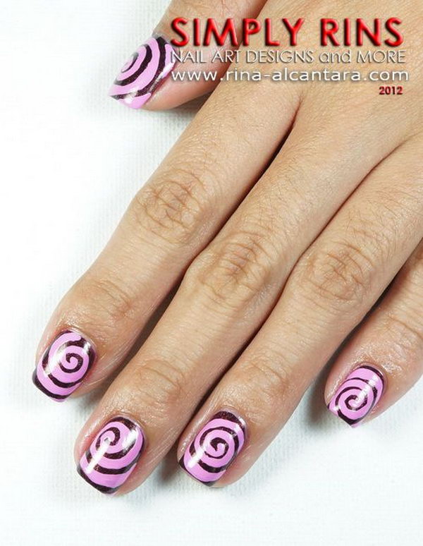 Cute And Creative Swirl Nail Art. Created using a technique called water marbling. It involves swirling together different colored nail polishes on nails.