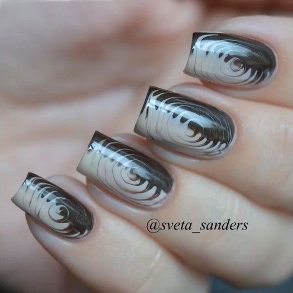 Cute And Creative Swirl Nail Art. Created using a technique called water marbling. It involves swirling together different colored nail polishes on nails.