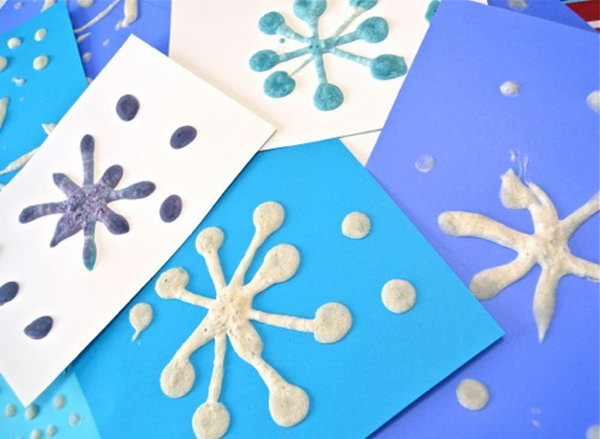 These puffy snowflake paintings are a fun open-ended art project that is simple and quick to do — with only 30 seconds drying time, 