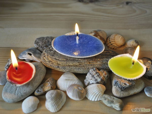 The shells that the ocean cast at your feet this summer make lovely remembrances of the season with candles formed inside them. 