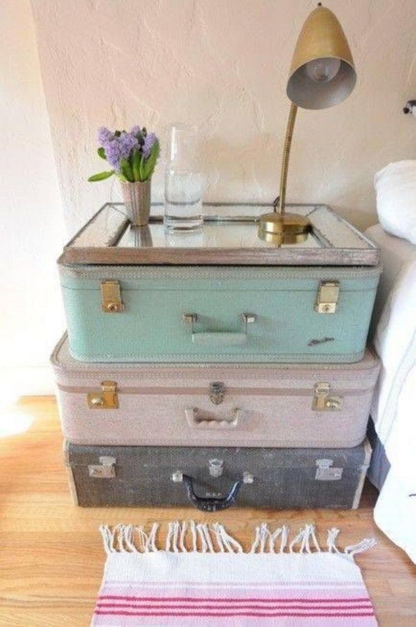 Stacked on top of one another, two or three suitcases can serve as an eye-catching, yet perfectly functional DIY nightstand.