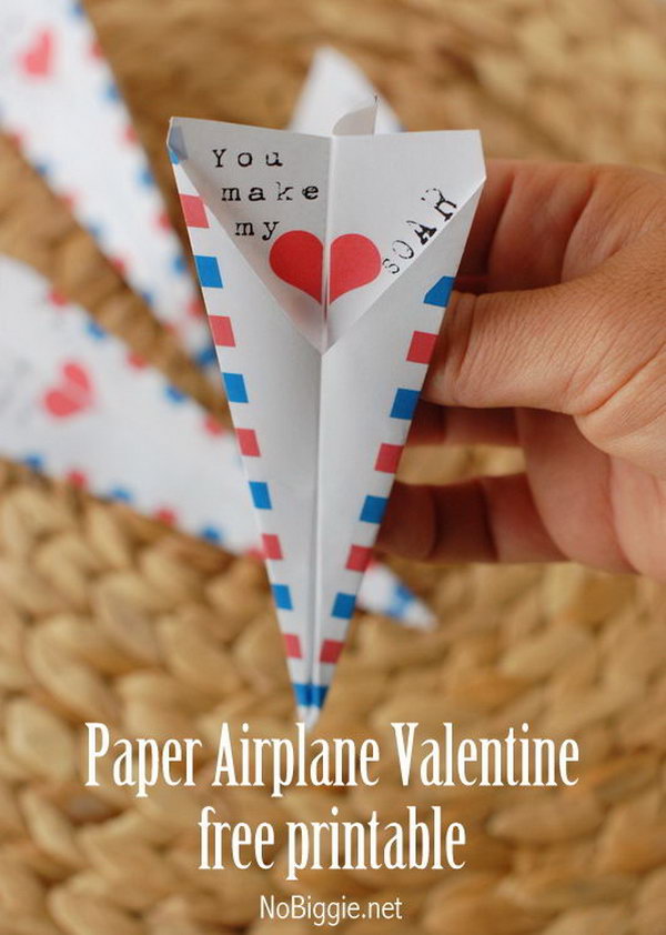 Paper airplane Valentine. A double sided paper airplane that reads 'You make my heart SOAR'. 