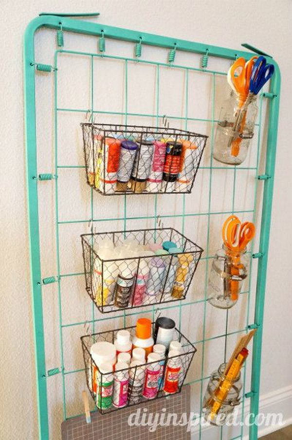 Use an old bed spring as a genius way to store all of your craft supplies. 