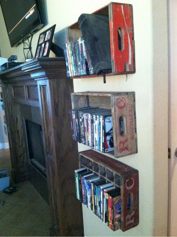 Attache these vintage soda crates to the wall on either side of the fireplace for DVD storage. 