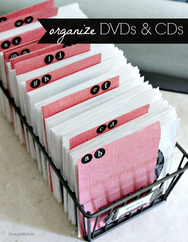 Reduce storage space by using the CD and DVD Sleeves. Make alphabet dividers out of sturdy scrapbook paper and stickers. It makes finding a movie simpler. 