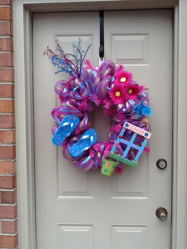 DIY Flip Flop Wreath Decoration. Add a splash of color to your home with a creative flip flop wreath on your door when summer is coming.