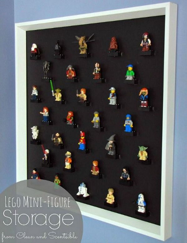 Turn a large picture frame with the glass removed into a DIY Lego Mini-figure display. 