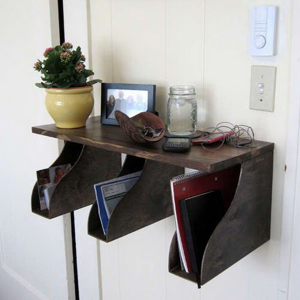 Make a handy storage station with a shelf and a few IKEA magazine holders. Position this right by the door, and never again will you wonder where your keys or phone wandered off to. 