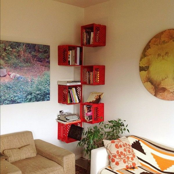 A floating corner bookshelf made from milk crates. 