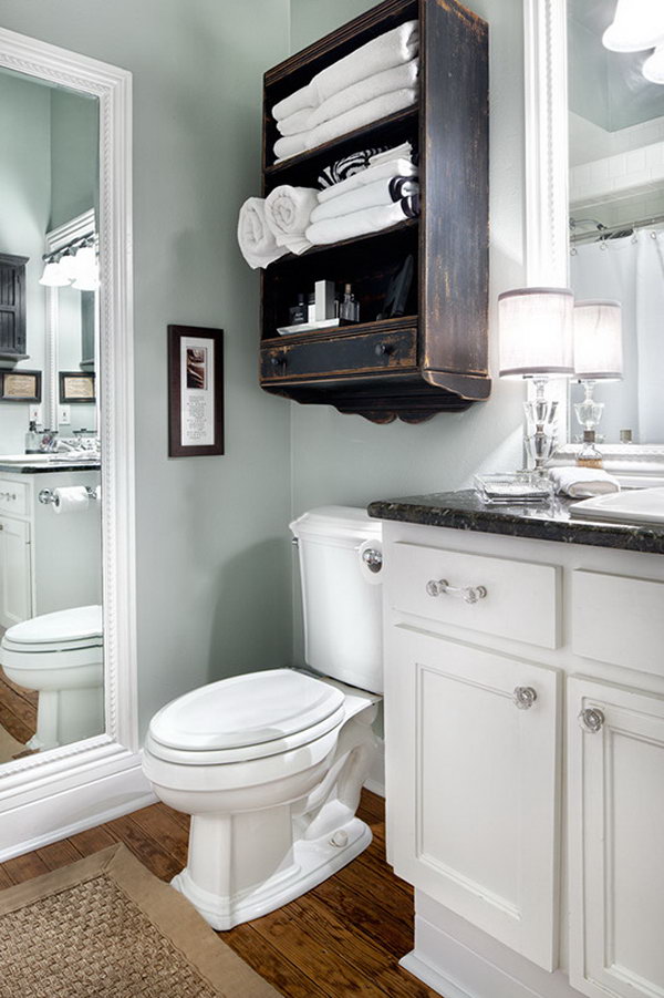 Cabinet above the toilet for extra bathroom space. 