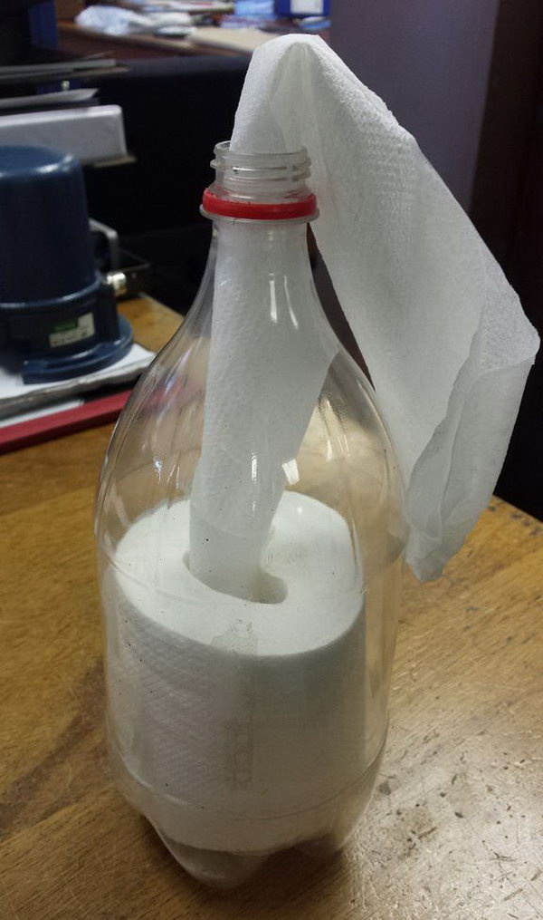 Create a toilet paper roll dispenser with used Coke bottle, which keeps puppy or cat from tearing up the entire roll. 