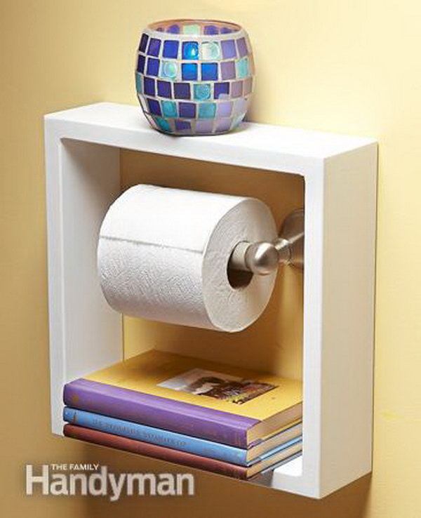 Take a deep shadow box picture frame and hung it around your toilet paper holder. It gives you two convenient shelves for small items in small bathroom. 