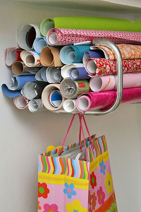 It's a clever idea to organize wrapping paper with bike racks.  