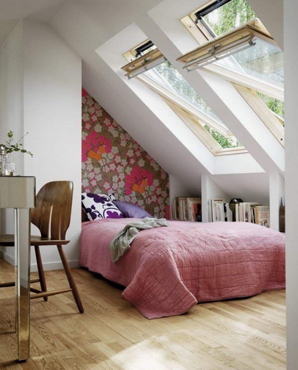 Use the dead space on the short side of the attic room to create built in bookshelves. 