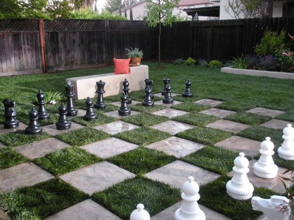 Giant Chess Board in Backyard. Interesting things to do out there in your backyard. So simple and cheap to make, and you could play them with your kids or family anytime.