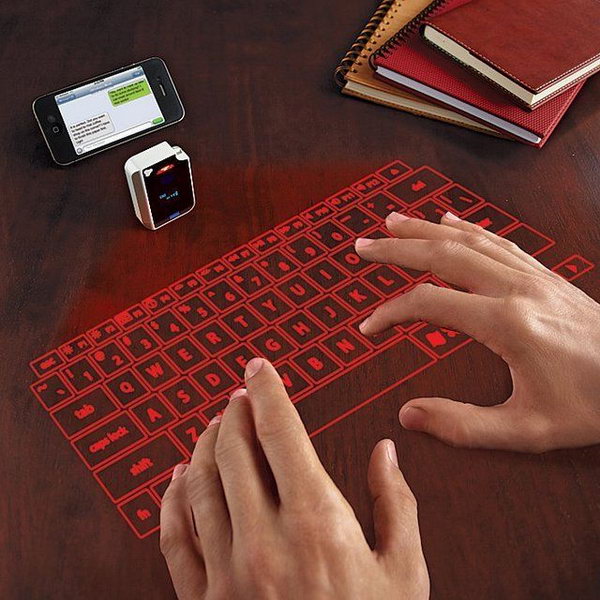 Virtual Keyboard From Brookstone. If you need a keyboard, this is the easiest carry-along one. The laser projection keyboard can turn every surface into such a cool keyboard. Your desk is your keyboard! Could you ever image this before? 