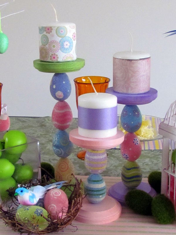 Colorful Easter Candle Holders. Use plastic eggs, wood candlesticks and dowel rods to create some adorable egg Candlesticks. Bunch together on your Easter Tablescape with some pretty candles and decorate your house on a budget. 
