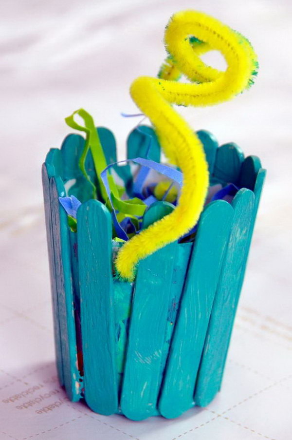 Mini Wooden Easter Baskets. Use a paper cup and mini craft sticks to create a DIY Easter basket. It's a cute craft which allows you display wonderful Easter eggs. 