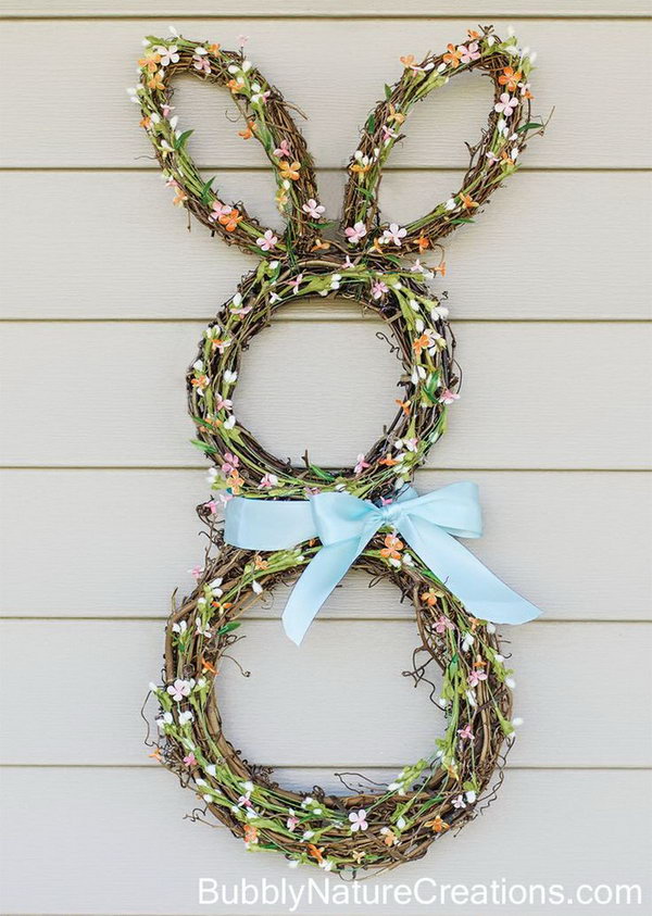 Easter Bunny Wreath. Celebrate the spring season and Easter with the homemade Easter Bunny Wreath. The green leaves, little flowers, ribbon accessories and cute bunny shape are sure to please everyone. 