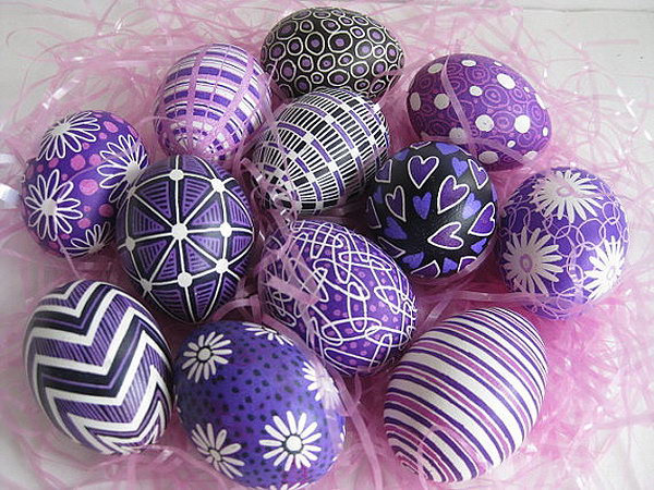 Purple and Lilac Pysanka Eggs. These pysankas painted with hot beeswas symbolize hope, life and prosperity.