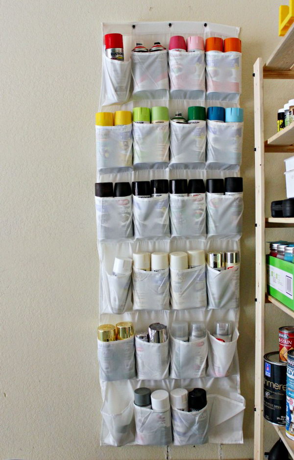 Garage Storage with Shoe Organizer. A great idea to recycle your old things and keep the spray paints from spreading out over shelves and bins. 