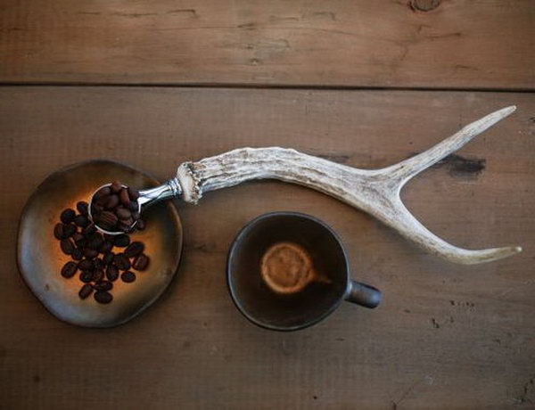 Antler Coffee Scoop. Cool gift for coffee lover friends. It allows them to enjoy their coffee in a new and interesting way.