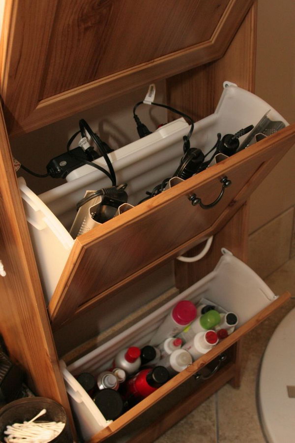 Use an Ikea shoe cabinet to store your curling irons, hair dryer and power strip. 