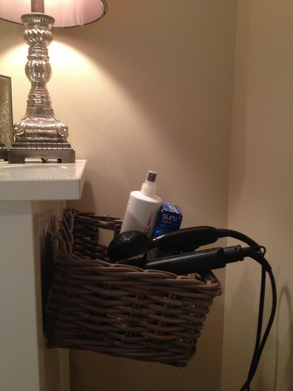 Organize Hair Dryer on Side of Dresser. Use 3M hooks and a basket to build a DIY hair dryer storage solution. 