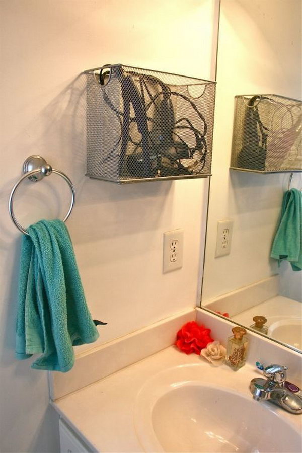 File Box Storage. Install a metal desktop file box on the bathroom wall to store your cooling hairdryer and straightener. It keeps things within easy reach and is convenient enough to grab what you need in the morning. 