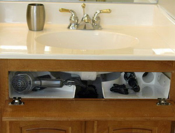 Curling Iron Holder Under Bathroom Sink. Install the storage unit behind your bathroom cabinet’s false front around the base of your sink basin. Free up wasted space in your cabinets and drawers and help clear off your countertops. 
