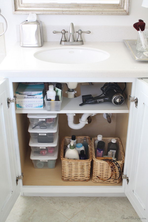 Add a shelf that was cut out for pipes in the cabinet. Use storage space above the shelf for hair dryer. 