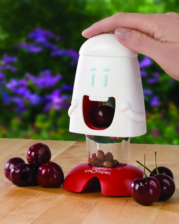 Cherry Pitter. Just place a cherry in his mouth and push down on his head, the plunger pushes the pit and juice down into a container below, leaving behind the pure fruit that can be used in desserts, salads and more.