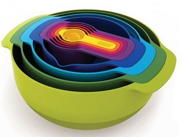 Joseph Joseph Compact Food Preparation Set. The bowls, cups and spoons within the set are stacked neatly together and occupy the absolute minimum amount of space. A clever housewarming gift idea for a small home or apartment. 