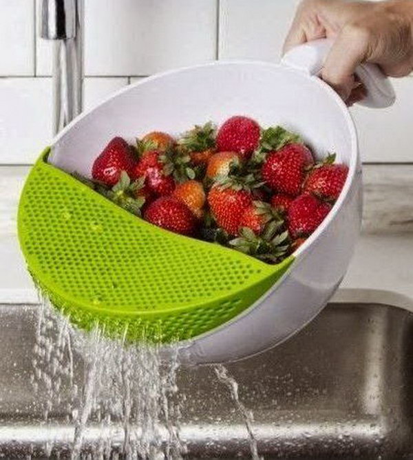Soak and Strain Washing Bowl. A cool kitchen product which allows you to wash your fresh fruits and drain them easily without having most of them fall into the sink. 