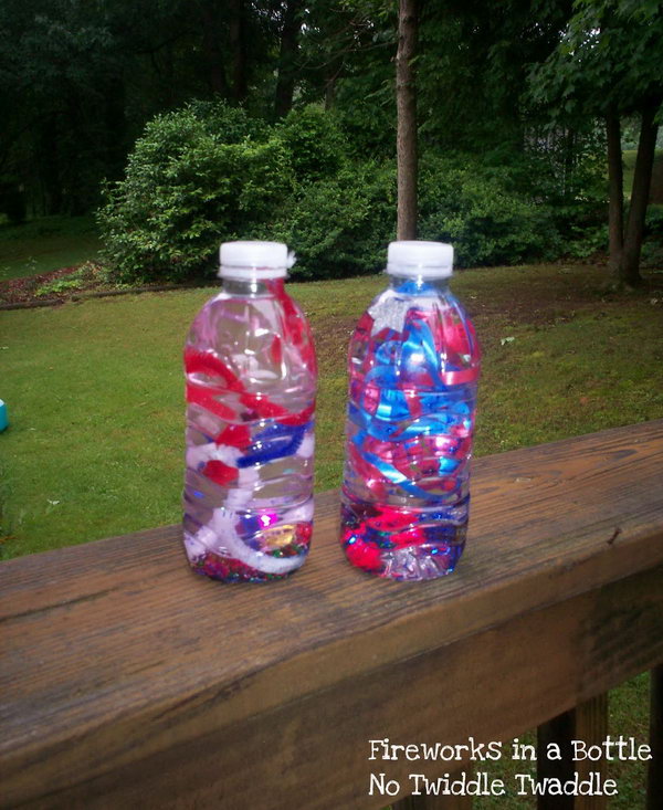 Fireworks in a Bottle. Fill the empty water bottle with red, white, and blue curling ribbon, glitter stars, confetti and buttons. Perfect for a patriotic holiday. 