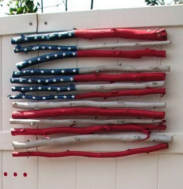 DIY Stick Flag. A cute idea to hang this twig flag on on front door for July 4th.  