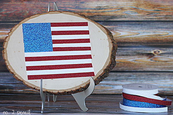 Glitter Tape Flag. Chic rustic craft made from pretty red, white, blue tapes, and wood slices. 