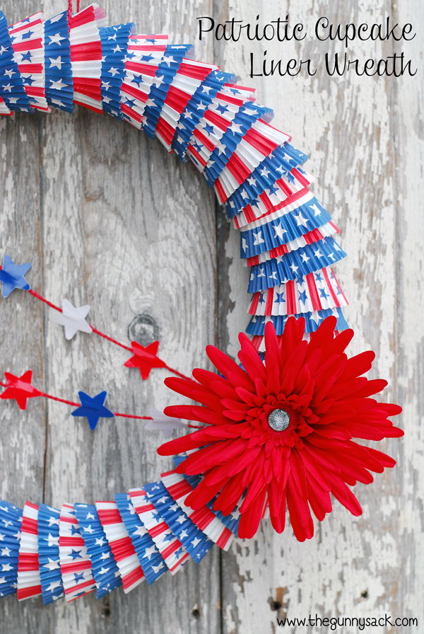 A patriotic cupcake liner wreath in red, white and blue that can be used for both Memorial Day and the 4th of July. 