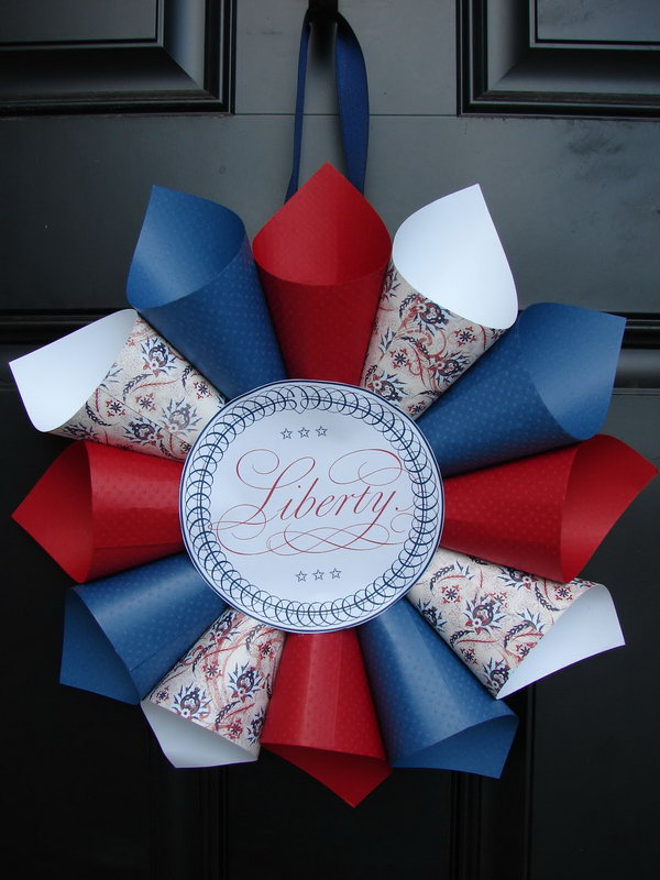 Patriotic Paper Cone Wreath. DIY Fourth of July Wreath made out of colored red, white and blue patterned papers. 
