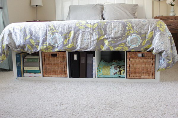 DIY Bed Platform with IKEA Expedit. Turn cube shelf from IKEA into cute under-the-bed storage. I love how the IKEA shelving units look at the foot of my bed and all the extra storage is so fabulous. 