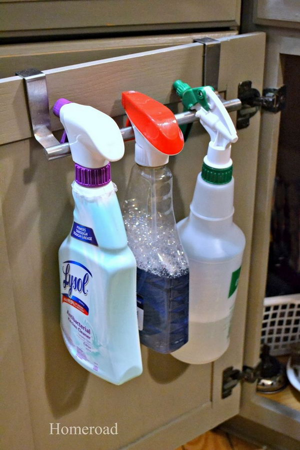 Over the cabinet towel holders. Hang your cleaners from over the cabinet door towel bar and free up space under the sink. 