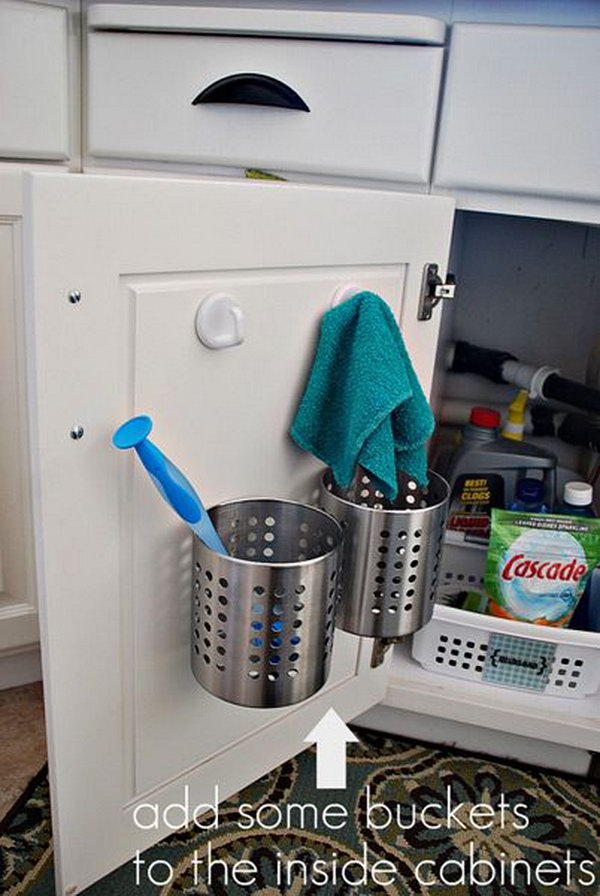 Buckets Over The Cabinet Door. Keep your sponges, brushes and pot scrapers sorted under the sink. Hide them out of sight while still giving them room to breathe and dry properly. 