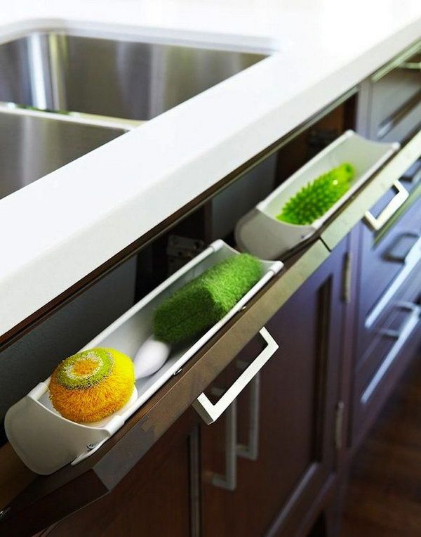 Under Kitchen Sink Storage. Use hidden pull out panel below kitchen sink to store sponges and accessories. 