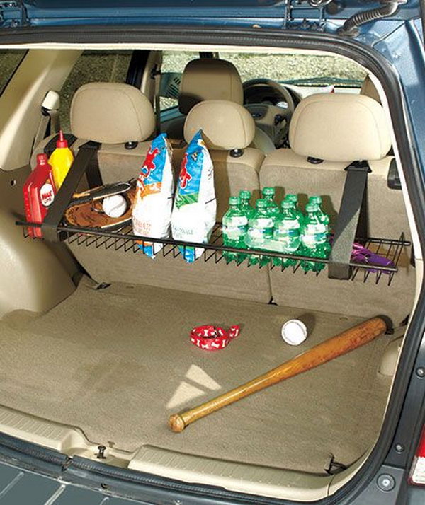 You can design a sturdy metal rack hanging from the rear seat of your vehicle with fabric-magic straps. It is a storage of grocery bags, sports equipment, drinks and more. Besides, you can fold it up when not in use so that it is out of the way against the back of the seat. 