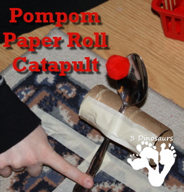 Pompom Paper Roll Catapult. To make this catapult is very easy. You can get the materials, like pompoms, a big spoon, paper roll, and masking tape around your house. 